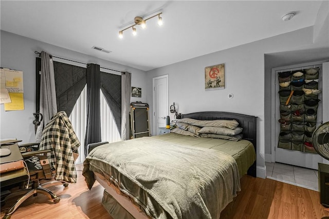 bedroom featuring wood finished floors