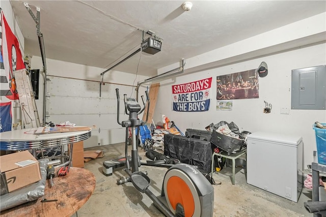garage featuring electric panel, fridge, and a garage door opener