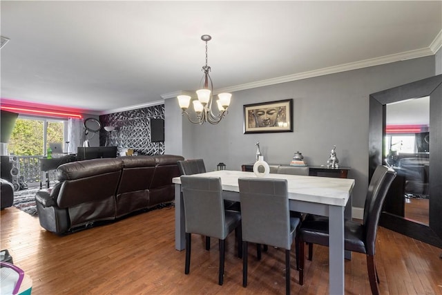 5 Morrill Ln Unit G, North Providence, RI 02904 - dining area with a chandelier, crown molding, and wood finished floors