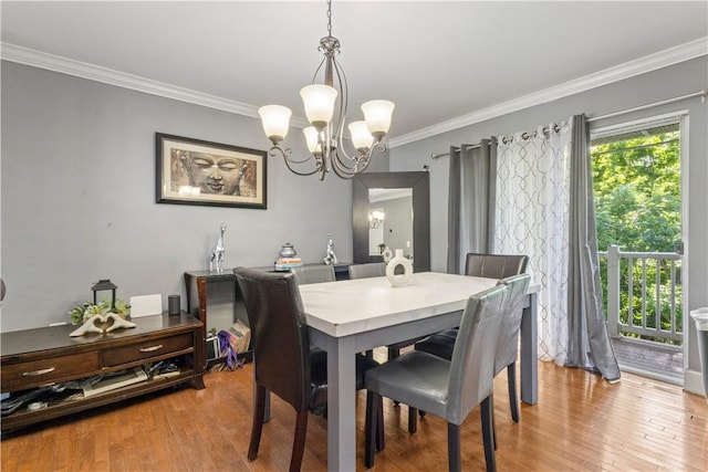5 Morrill Ln Unit G, North Providence, RI 02904 - dining room with a chandelier, ornamental molding, and light wood finished floors