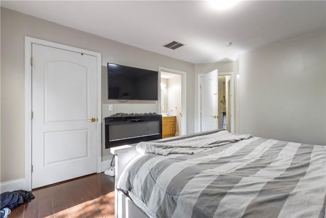 5 Morrill Ln Unit G, North Providence, RI 02904 - bedroom with wood finished floors and ensuite bathroom