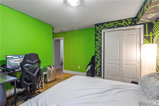 5 Morrill Ln Unit G, North Providence, RI 02904 - bedroom with a closet, wood finished floors, and a desk