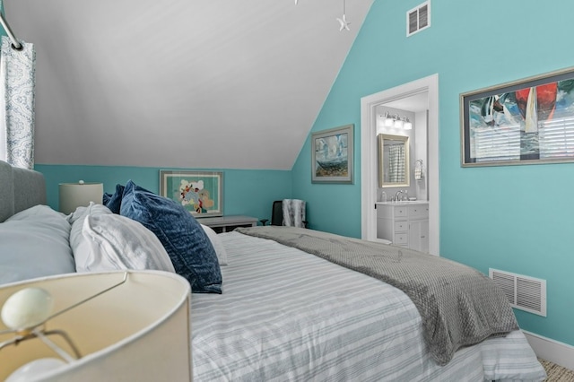 224 Gibbs Ave, Newport, RI 02840 - bedroom featuring vaulted ceiling, a sink, baseboards, and ensuite bath
