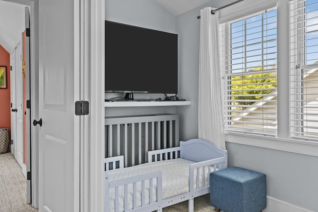 224 Gibbs Ave, Newport, RI 02840 - bedroom featuring a nursery area, lofted ceiling, and baseboards