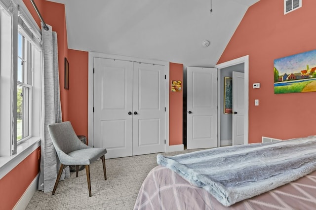 224 Gibbs Ave, Newport, RI 02840 - bedroom with vaulted ceiling, a closet, carpet floors, and baseboards