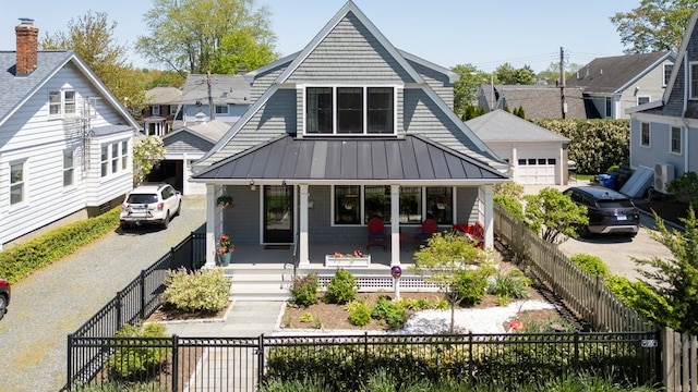 224 Gibbs Ave, Newport, RI 02840 - back of property with covered porch, a standing seam roof, and metal roof
