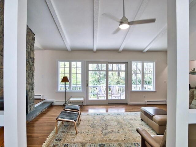 58 Leonard Dr, Tiverton, RI 02878 - living area featuring a baseboard radiator, ceiling fan, wood finished floors, and plenty of natural light
