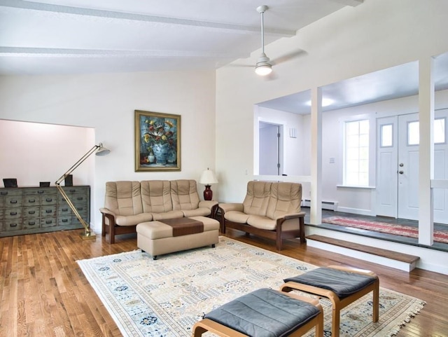 58 Leonard Dr, Tiverton, RI 02878 - living room with wood finished floors, a baseboard radiator, ceiling fan, and baseboards