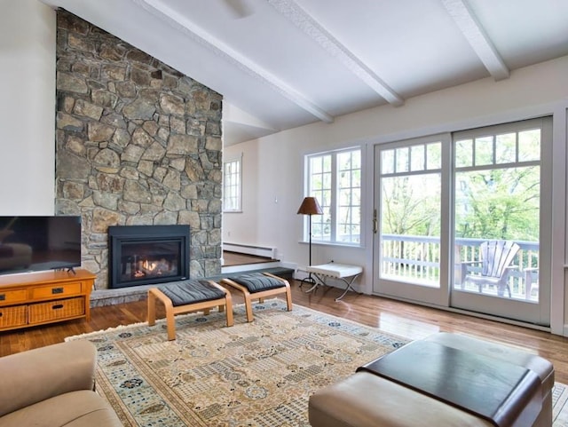 58 Leonard Dr, Tiverton, RI 02878 - living area featuring a baseboard radiator, wood finished floors, and a fireplace