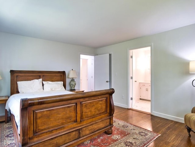 58 Leonard Dr, Tiverton, RI 02878 - bedroom featuring wood finished floors, baseboards, and ensuite bathroom