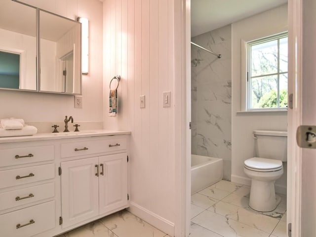 58 Leonard Dr, Tiverton, RI 02878 - bathroom with marble look tiles, vanity, toilet, baseboards, and shower / bathtub combination