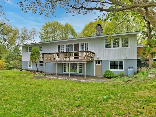 58 Leonard Dr, Tiverton, RI 02878 - rear view of house featuring a lawn, a chimney, and a deck