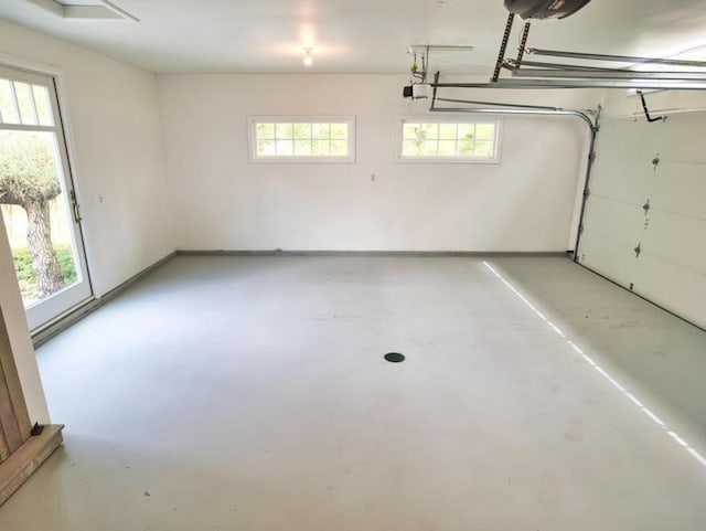 58 Leonard Dr, Tiverton, RI 02878 - garage featuring a garage door opener
