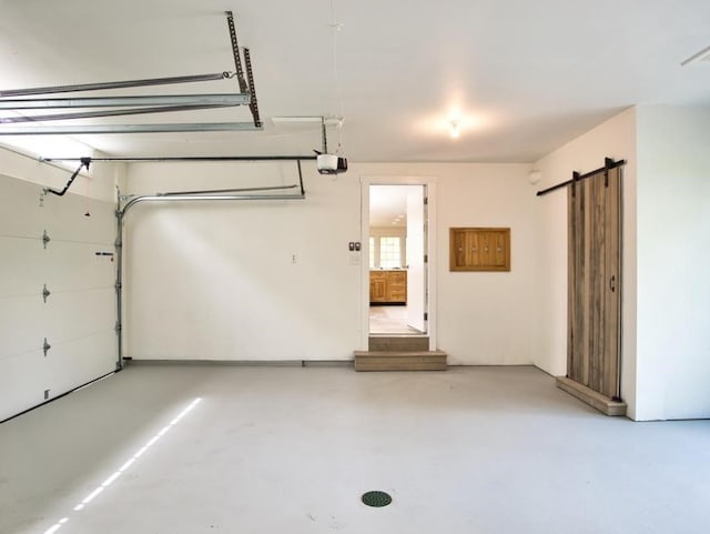58 Leonard Dr, Tiverton, RI 02878 - garage featuring a garage door opener