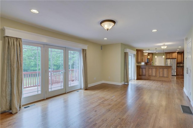34 Ledgefield Rd, Scituate, RI 02857 - unfurnished living room featuring recessed lighting, baseboards, and light wood finished floors