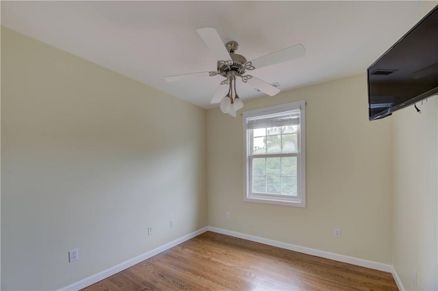 34 Ledgefield Rd, Scituate, RI 02857 - unfurnished room featuring wood finished floors, baseboards, and a ceiling fan