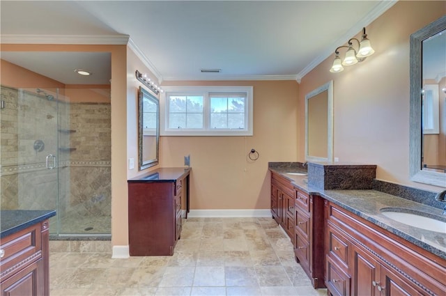 34 Ledgefield Rd, Scituate, RI 02857 - full bath featuring double vanity, a shower stall, baseboards, and crown molding