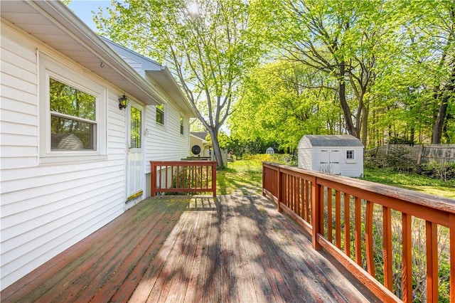 54 Glenwood Dr, North Kingstown, RI 02852 - wooden terrace featuring a storage unit, an outbuilding, and fence