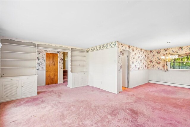 54 Glenwood Dr, North Kingstown, RI 02852 - unfurnished room featuring wallpapered walls, a chandelier, carpet floors, a baseboard radiator, and wainscoting