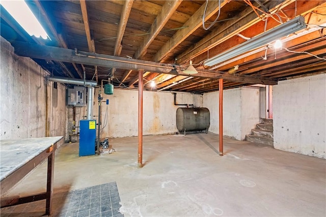 54 Glenwood Dr, North Kingstown, RI 02852 - unfinished basement with heating fuel, a heating unit, stairs, and electric panel