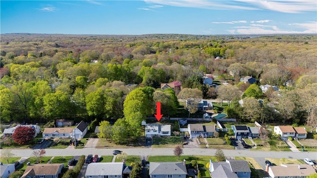 54 Glenwood Dr, North Kingstown, RI 02852 - aerial overview of property's location with a heavily wooded area and nearby suburban area