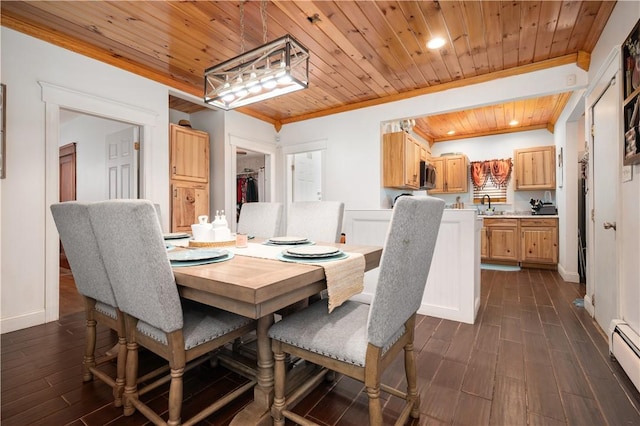 645 Providence St, Woonsocket, RI 02895 - dining area with wooden ceiling, dark wood-style flooring, ornamental molding, a baseboard radiator, and recessed lighting