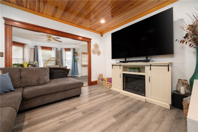 645 Providence St, Woonsocket, RI 02895 - living room featuring wood ceiling, wood finished floors, a glass covered fireplace, recessed lighting, and a ceiling fan