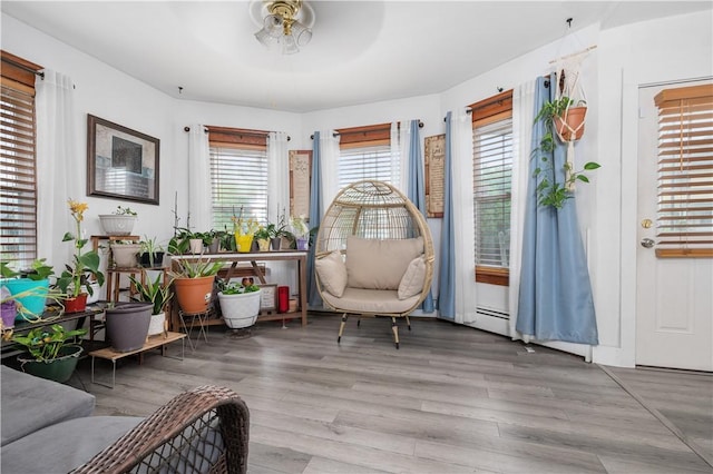 645 Providence St, Woonsocket, RI 02895 - sitting room featuring ceiling fan and wood finished floors
