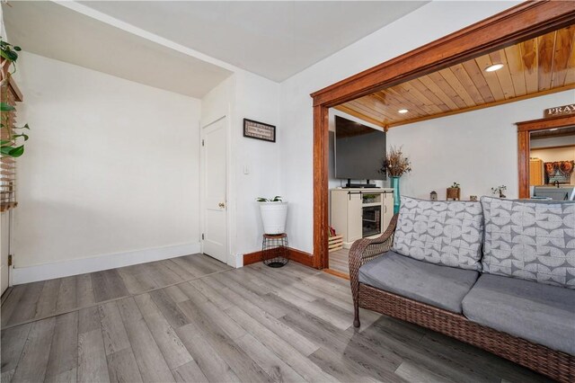 645 Providence St, Woonsocket, RI 02895 - living room featuring wood finished floors, baseboards, recessed lighting, and wooden ceiling