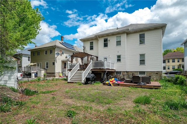 645 Providence St, Woonsocket, RI 02895 - back of property with a deck, a gazebo, an outdoor hangout area, stairs, and central AC unit