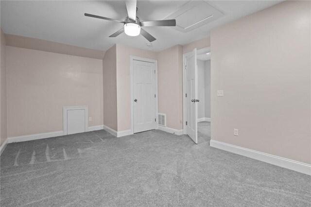 unfurnished room with ceiling fan, carpet floors, and baseboards