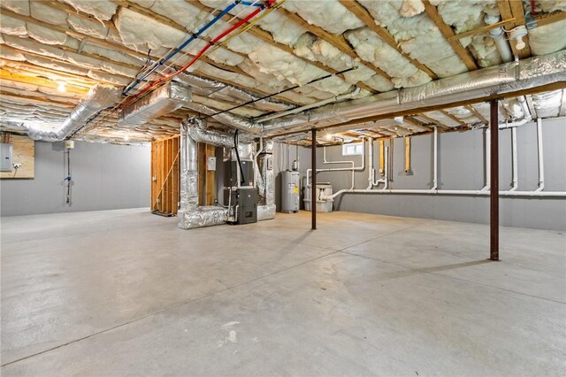 unfinished basement with water heater, electric panel, and heating unit