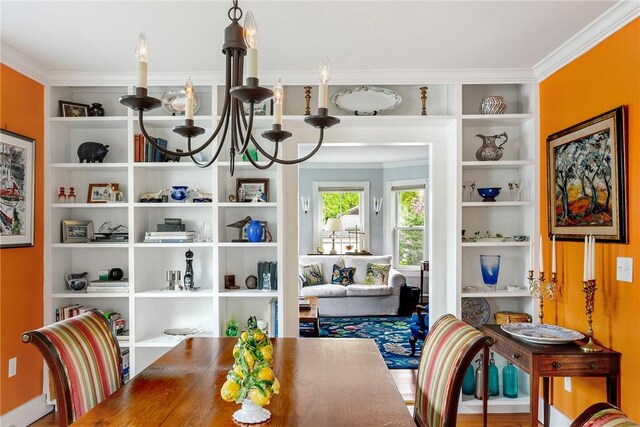15 Cross St, Newport, RI 02840 - dining room featuring a chandelier, ornamental molding, and built in shelves