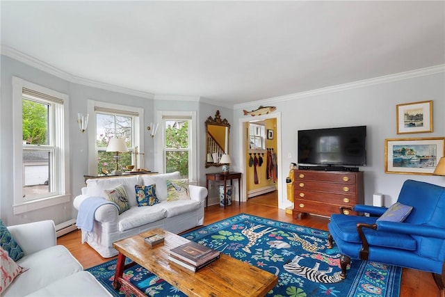 15 Cross St, Newport, RI 02840 - living area featuring baseboard heating, ornamental molding, a baseboard heating unit, and wood finished floors