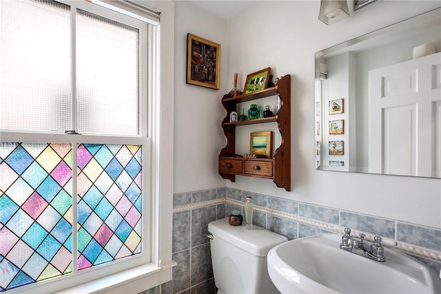 15 Cross St, Newport, RI 02840 - half bathroom with a sink, tile walls, wainscoting, and toilet