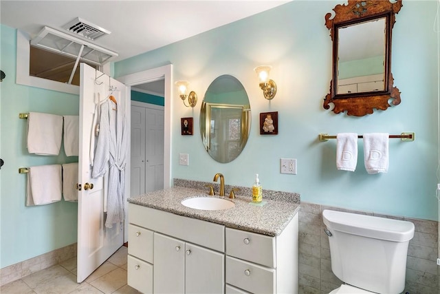 15 Cross St, Newport, RI 02840 - full bathroom featuring tile patterned flooring, a stall shower, toilet, and vanity