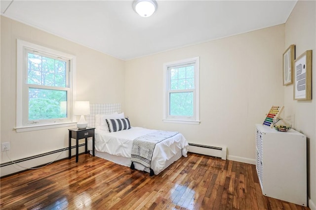 7 Maggio Ave, Westerly, RI 02891 - bedroom featuring a baseboard heating unit and hardwood / wood-style floors