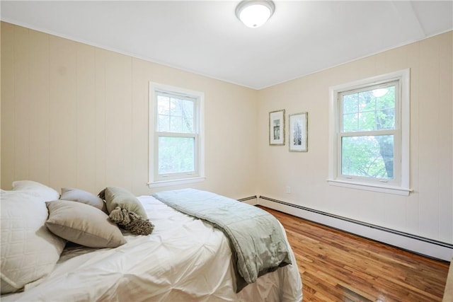 7 Maggio Ave, Westerly, RI 02891 - bedroom with a baseboard heating unit and wood finished floors