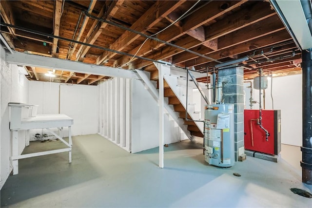 7 Maggio Ave, Westerly, RI 02891 - unfinished below grade area with gas water heater and stairway
