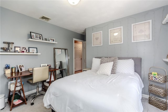 bedroom with carpet flooring and baseboards