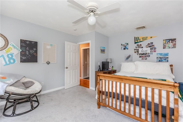 bedroom featuring carpet flooring, baseboards, and a ceiling fan