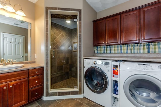 clothes washing area with washer and dryer