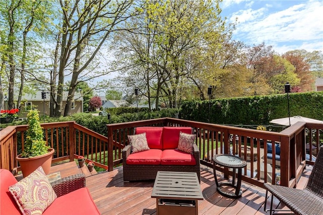 deck with an outdoor hangout area