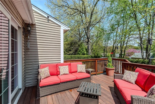 wooden deck with outdoor lounge area