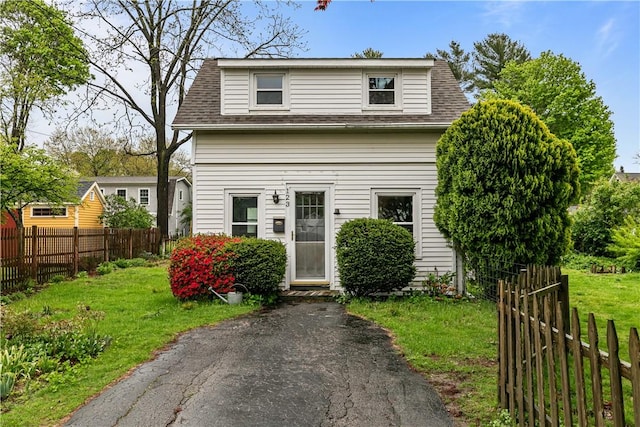 view of front of home with roof with shingles