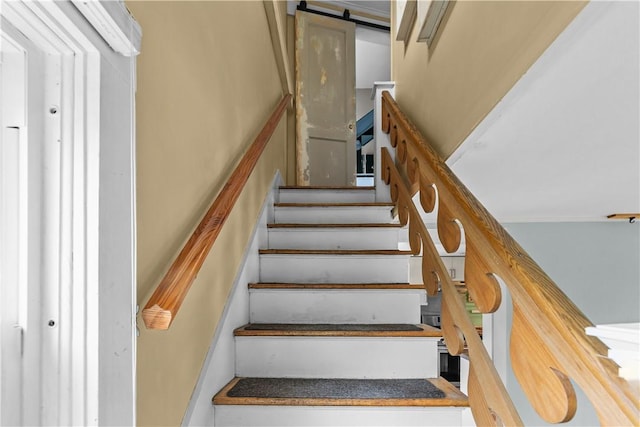 stairs with a barn door