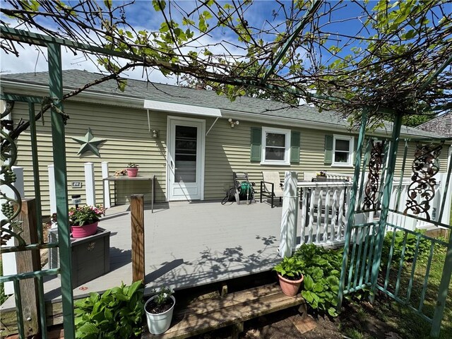 back of property with a deck