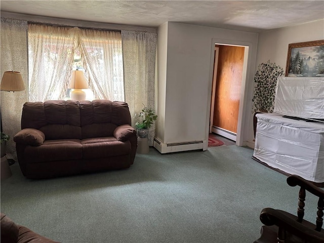 carpeted living room with baseboard heating