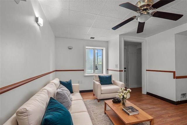 37 Pinewood Dr, North Providence, RI 02904 - living area with a paneled ceiling, wood finished floors, a ceiling fan, and baseboards