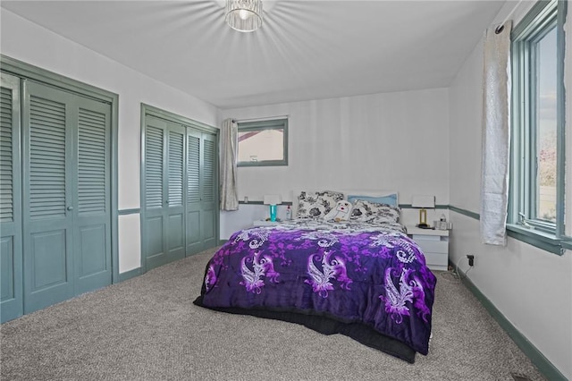 37 Pinewood Dr, North Providence, RI 02904 - bedroom with carpet flooring and multiple closets